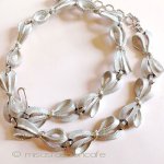 Ｔｒｉｆａｒｉ　 トリファリ 銀のリボン・ネックレス