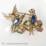 Coro 鳥と花ブローチ