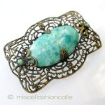 アンティークブローチ 透かし彫りペキンガラス